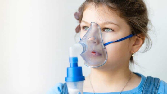 Child with a respirator